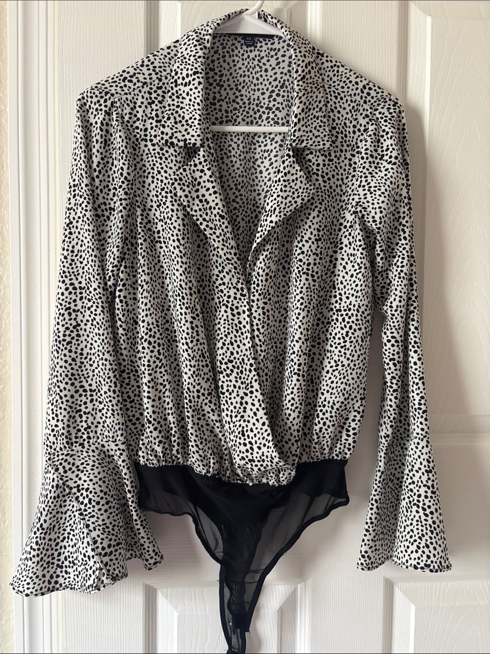 Lulu's Black & White Polka Dot Surplice Long-Sleeve Bodysuit